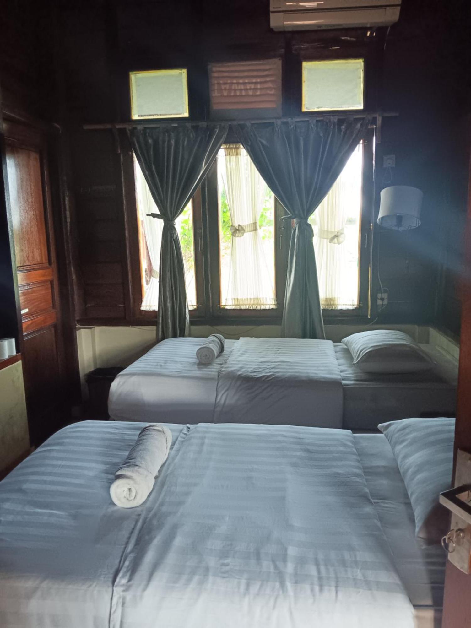 Oinan Guest House Tua Pejat ภายนอก รูปภาพ