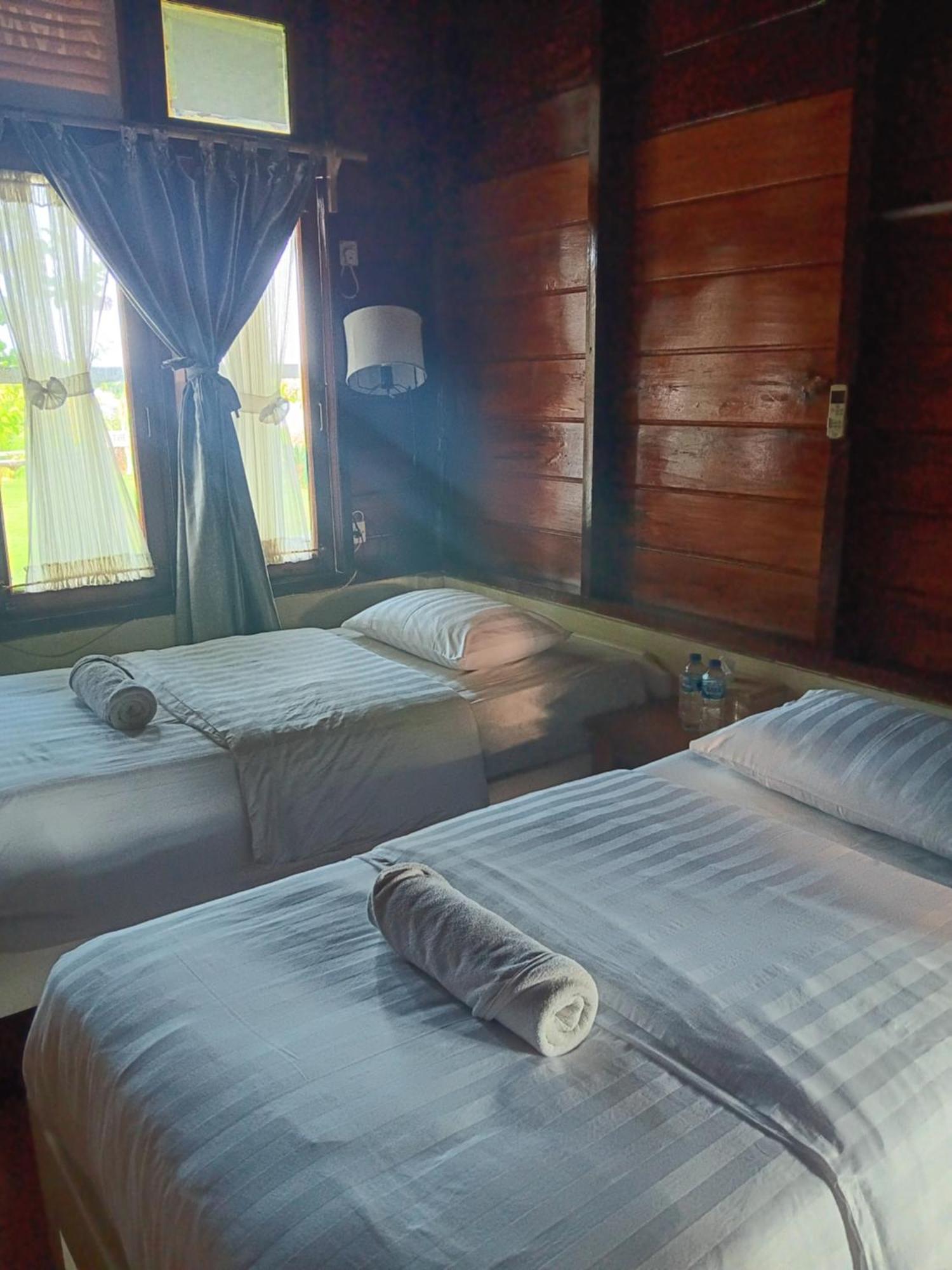 Oinan Guest House Tua Pejat ห้อง รูปภาพ